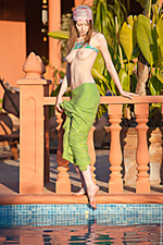 Skinny beauty goes nude outdoor